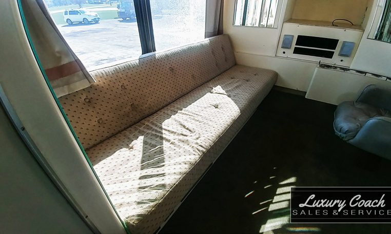 View of the Meeting Room Sofa of 1985 MCI 96-A3 at Luxury Coach