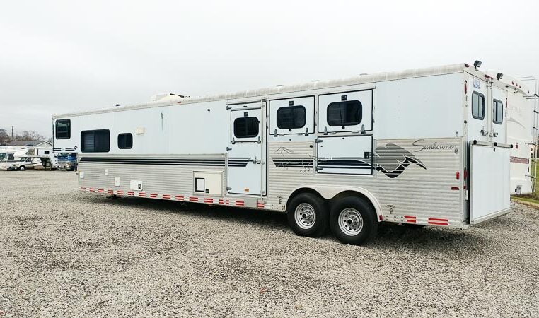 View of the Driver Side of a 99 Sundowner Horse Trailer at Luxury Coach