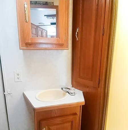 View of the Sink in a 1999 Sundowner Horse Trailer at Luxury Coach