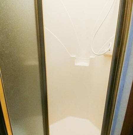 View of the Shower in a 1999 Sundowner Horse Trailer at Luxury Coach