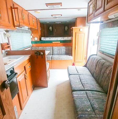 View of the Living Quarters in a 1999 Sundowner Horse Trailer at Luxury Coach