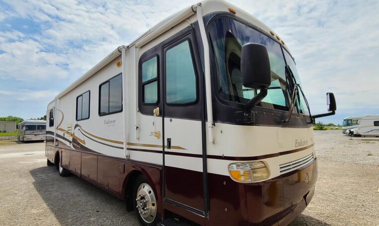 1998 Holday Rambler Endeavor at Luxury Coach - Front Curbside View
