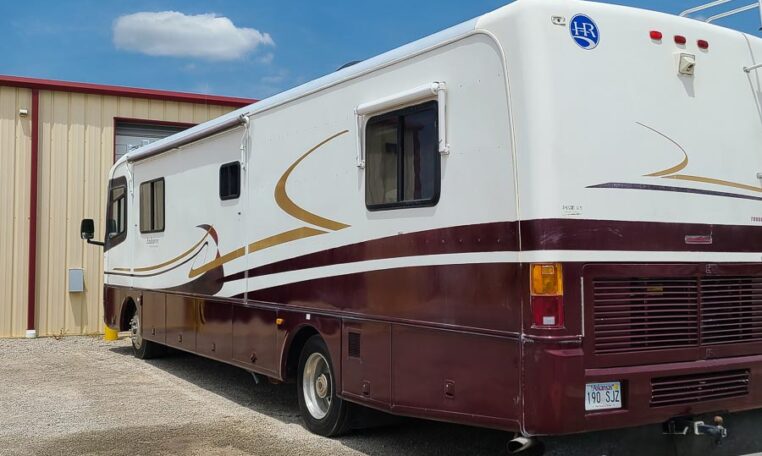 1998 Holday Rambler Endeavor at Luxury Coach - Back Curbside View