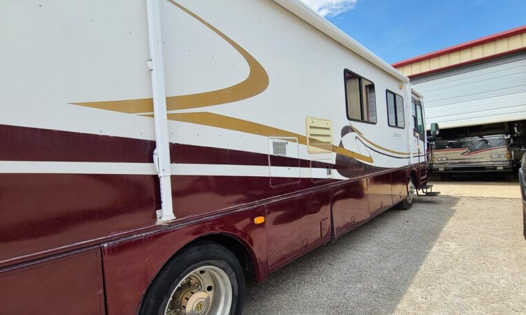 1998 Holday Rambler Endeavor at Luxury Coach - Awning Curbside View