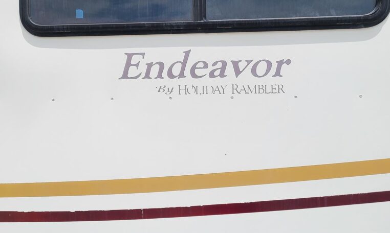 1998 Holday Rambler Endeavor at Luxury Coach - Endeavor Logo