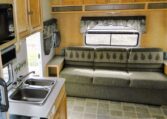 View of Living Area in 2005 Trail Cruiser from Luxury Coach